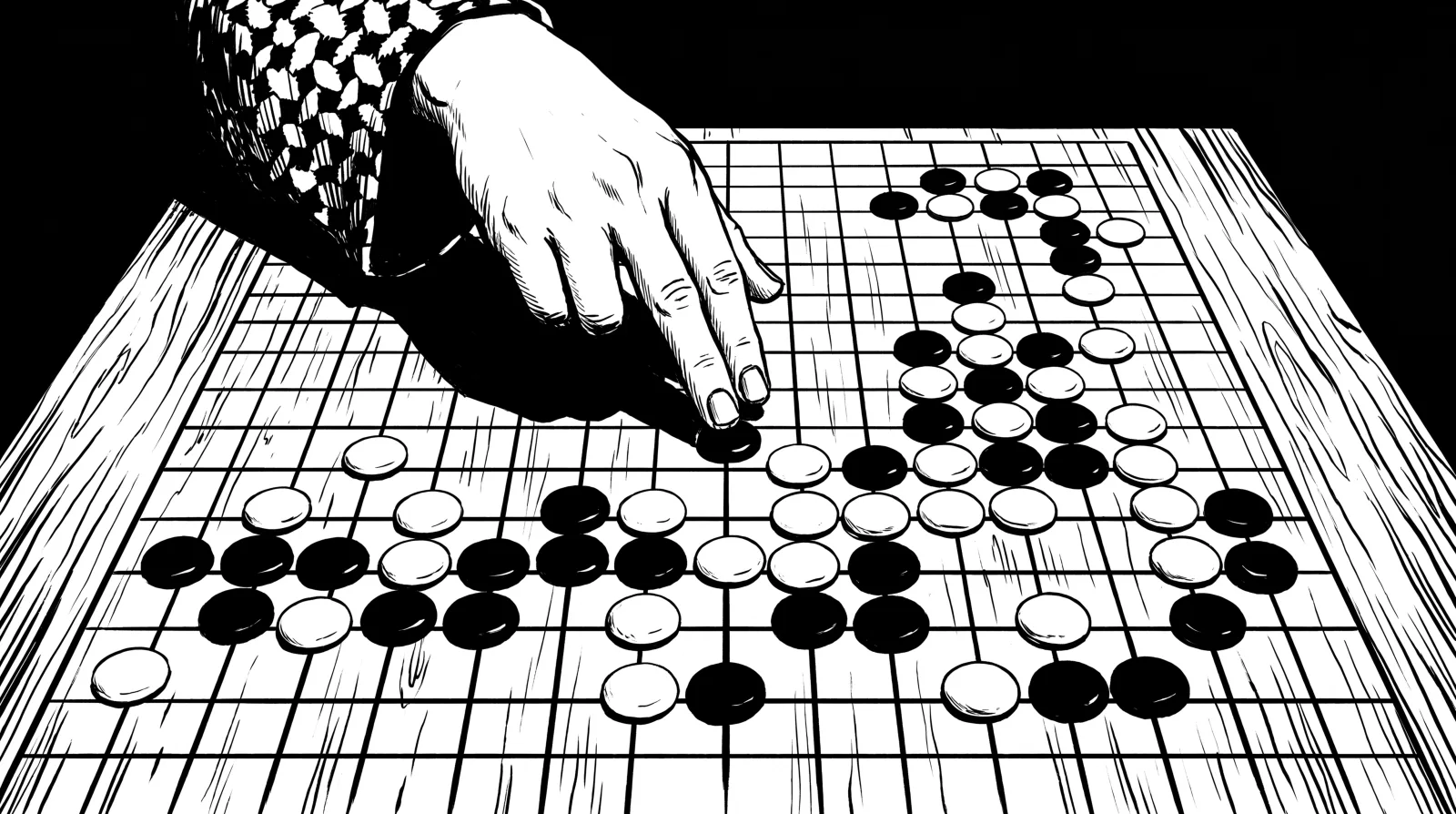 A hand placing a black stone on a 19×19 board mid-game, with clusters of stones in formation around the upper right and bottom edges.